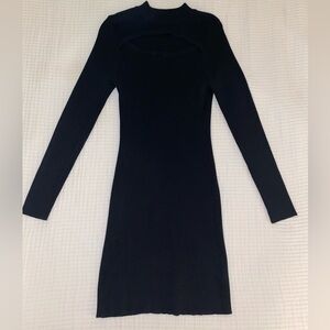 Black long sleeve sweater dress with cut out in the front